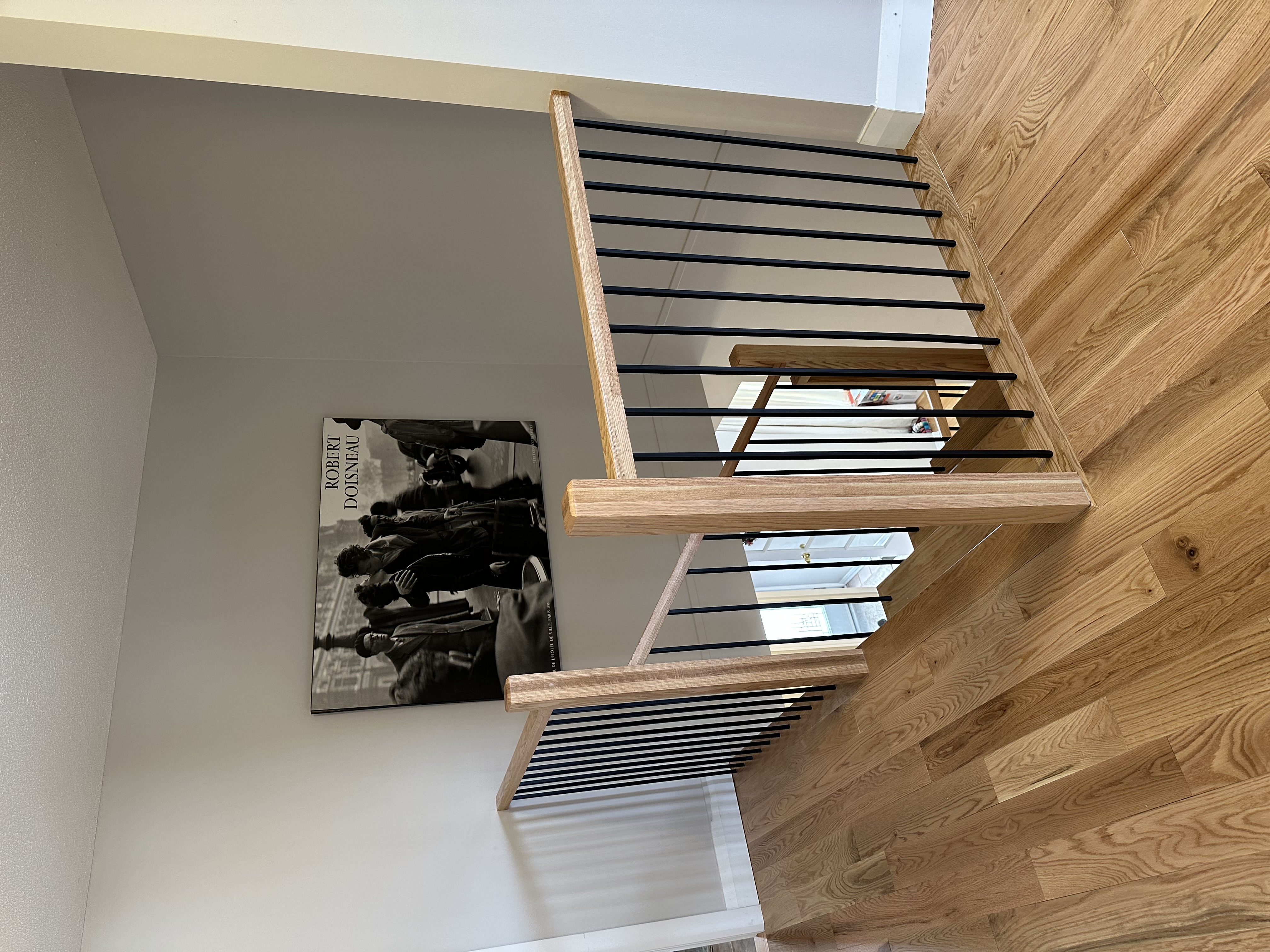 Custom staircase upper landing and railing detail