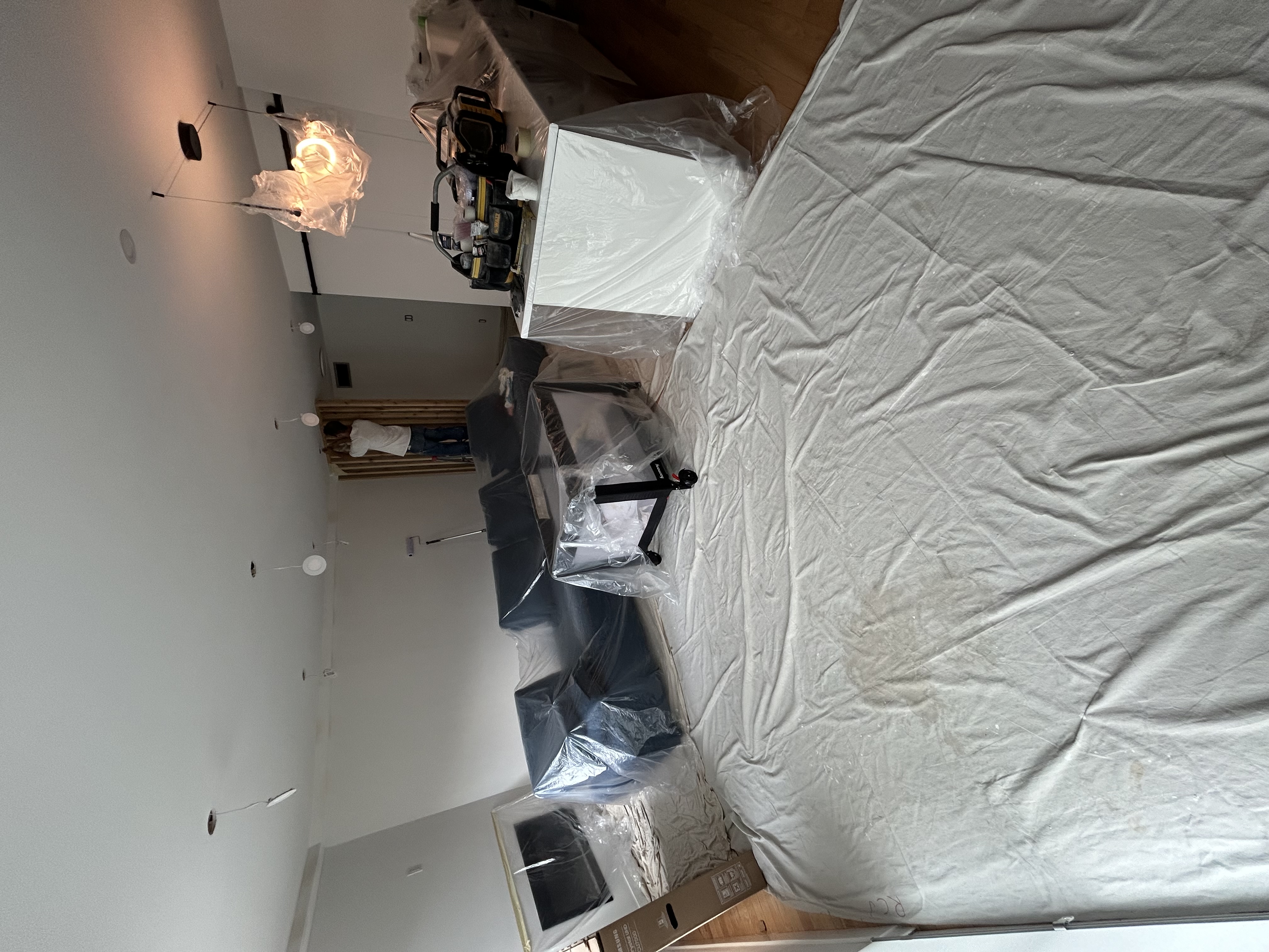 Living space mid-finishing, protective coverings in place